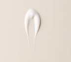 A smear of the conditioner, showing a thick white cream